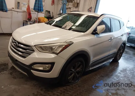 2014 Hyundai Santa Fe Sport 2.4L z USA, uszkodzony, nr VIN 5XYZU3LB9EG218191